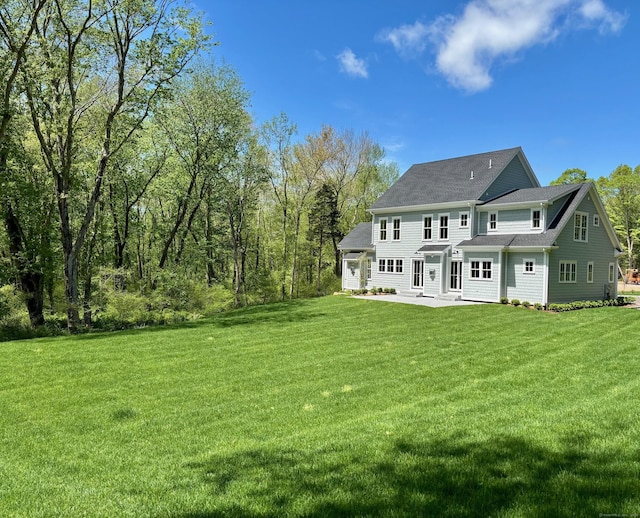 412 Tanner Marsh Rd, Guilford, CT 06437 - back of house featuring a patio and a yard