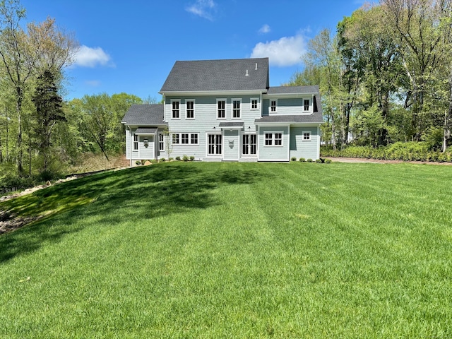 412 Tanner Marsh Rd, Guilford, CT 06437 - back of house featuring a yard and a shingled roof