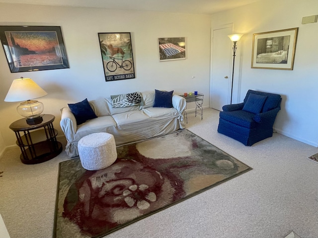 carpeted living room featuring baseboards