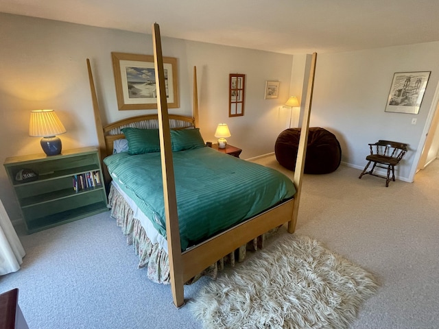 carpeted bedroom with baseboards