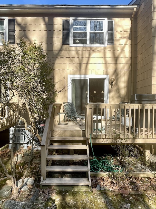 exterior space featuring a wooden deck