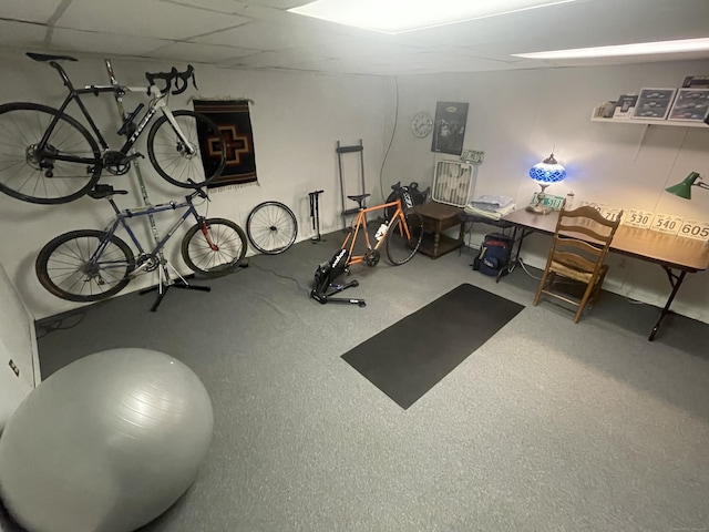 workout area with a drop ceiling