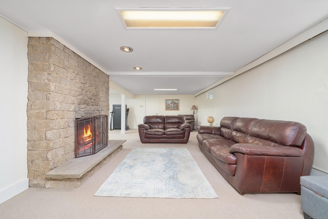 carpeted living room featuring a brick fireplace