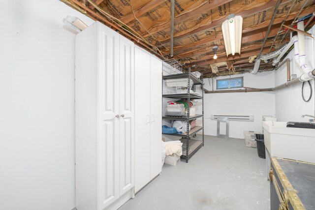 unfinished basement with a sink