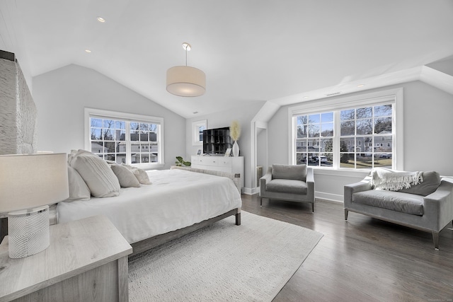 bedroom featuring recessed lighting, baseboards, lofted ceiling, and wood finished floors