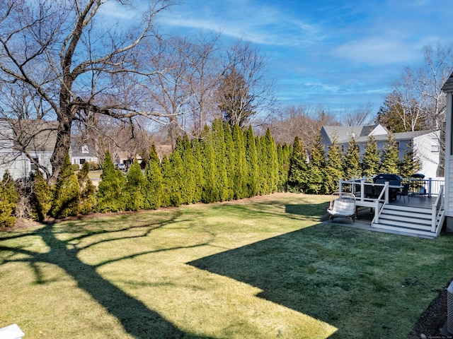 view of yard with a deck