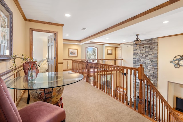 hall featuring crown molding, carpet flooring, an upstairs landing, and recessed lighting