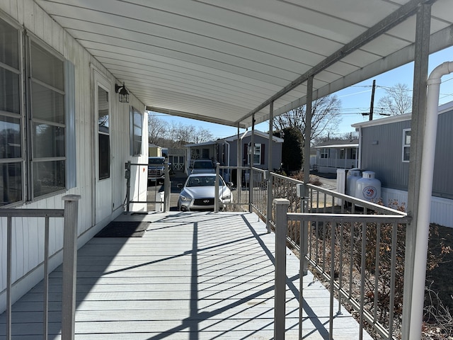 wooden deck with a residential view