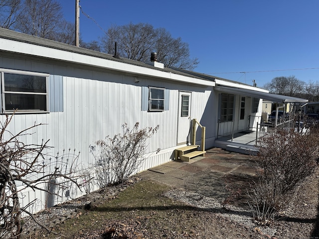 view of home's exterior with a patio area