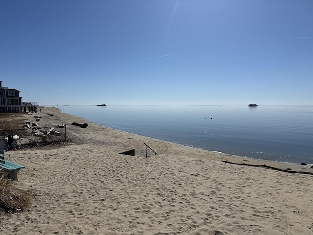 view of water feature with a beach view