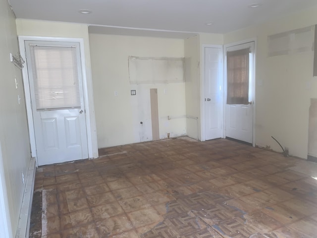 empty room featuring baseboard heating