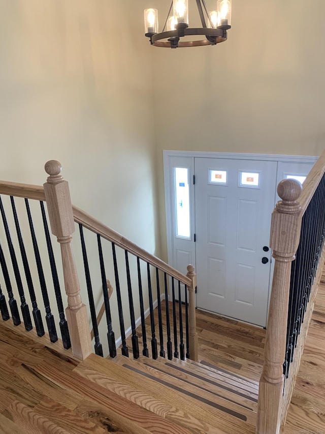 entryway featuring a chandelier and light wood-style floors