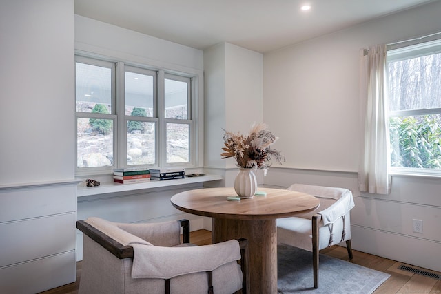dining area featuring visible vents, wood finished floors, a wealth of natural light, and recessed lighting