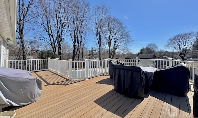 deck featuring a grill