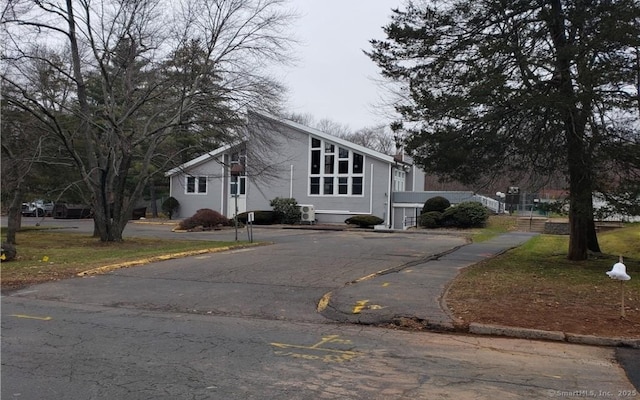 exterior space with aphalt driveway