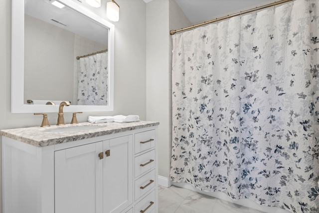 bathroom featuring a shower with shower curtain, visible vents, marble finish floor, and vanity