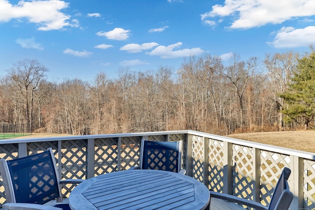 deck featuring outdoor dining space