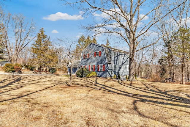 exterior space featuring a gambrel roof