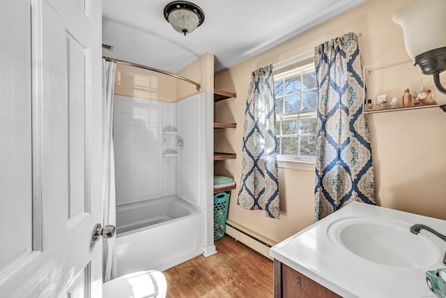 full bath with vanity, wood finished floors, shower / tub combo with curtain, and a baseboard radiator