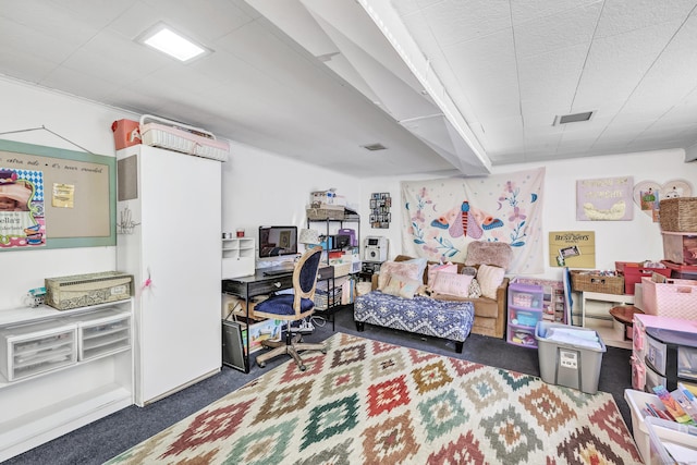 carpeted home office with visible vents