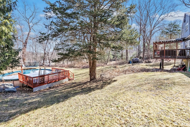 view of yard with a wooden deck