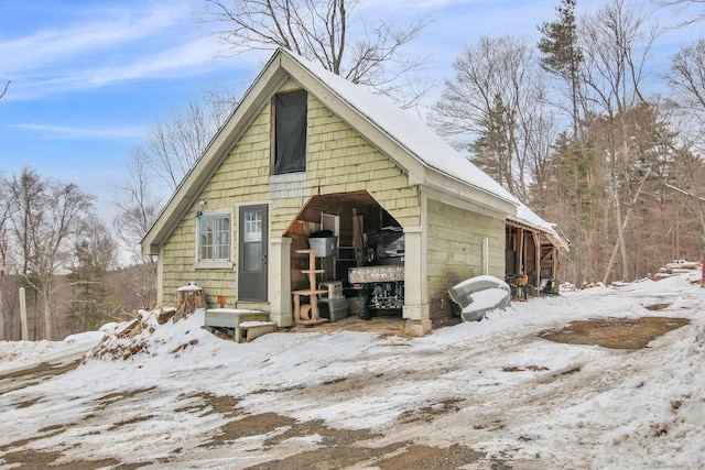 view of snow covered garage