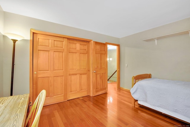 bedroom with light wood-type flooring