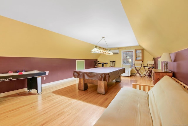 game room featuring baseboards, an AC wall unit, lofted ceiling, wood finished floors, and billiards