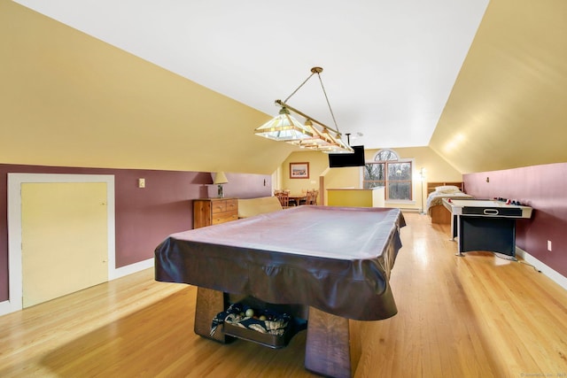 game room with billiards, light wood-style flooring, baseboards, and lofted ceiling