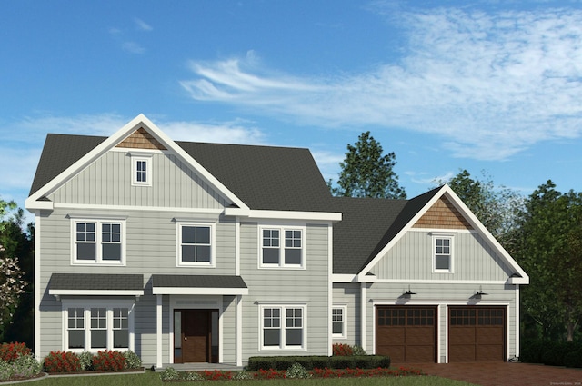 view of front of home featuring board and batten siding, driveway, and roof with shingles