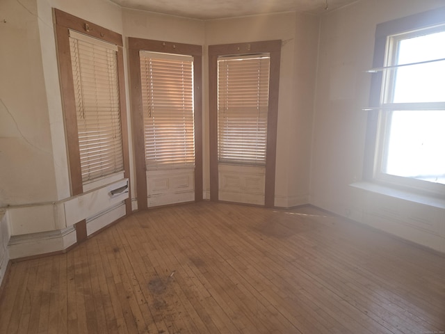 empty room featuring hardwood / wood-style flooring