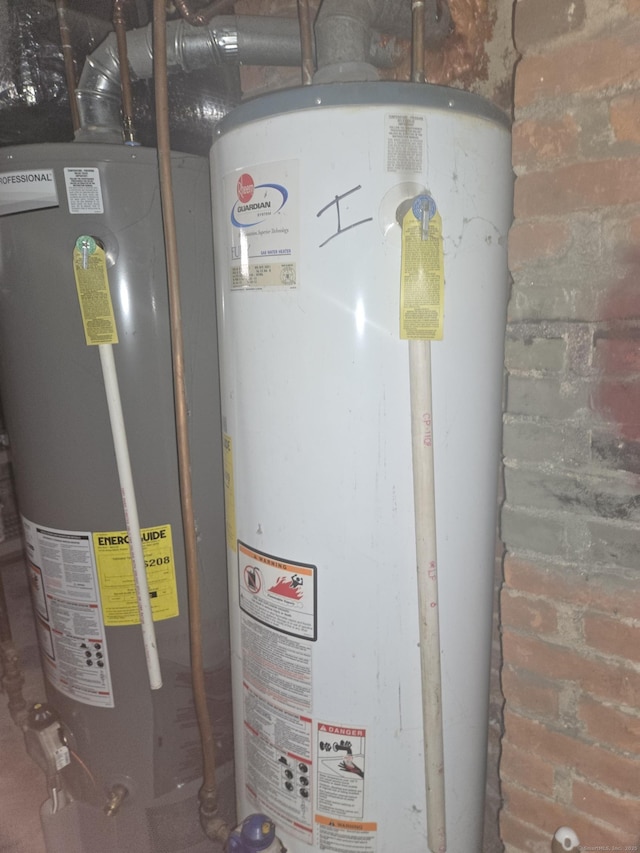 utility room featuring gas water heater