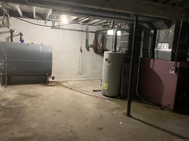 unfinished basement with heating fuel and water heater