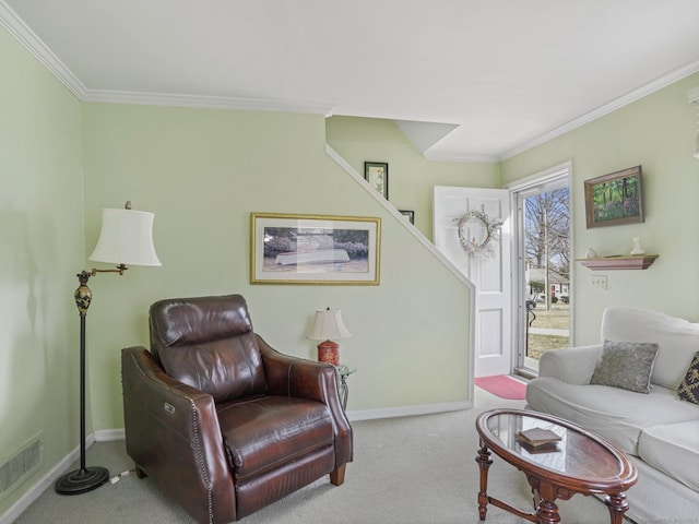 carpeted living area with visible vents, baseboards, and crown molding