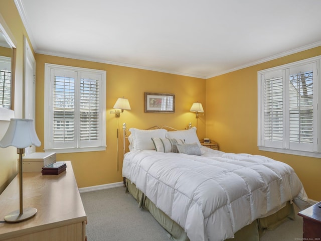 bedroom with baseboards, carpet floors, and ornamental molding