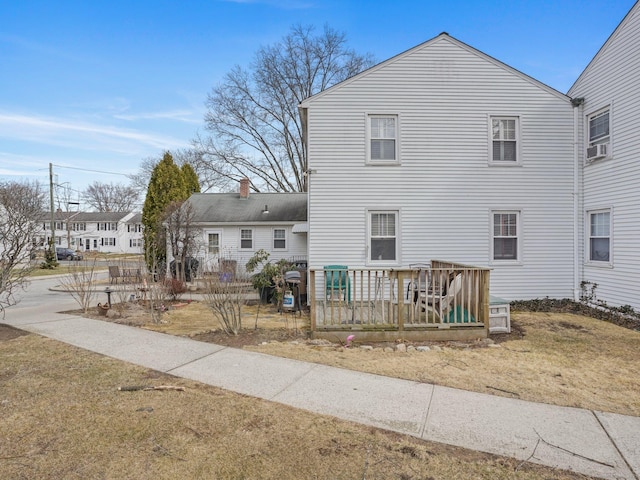 view of front of property featuring cooling unit