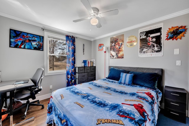 bedroom with ceiling fan, wood finished floors, baseboards, and ornamental molding