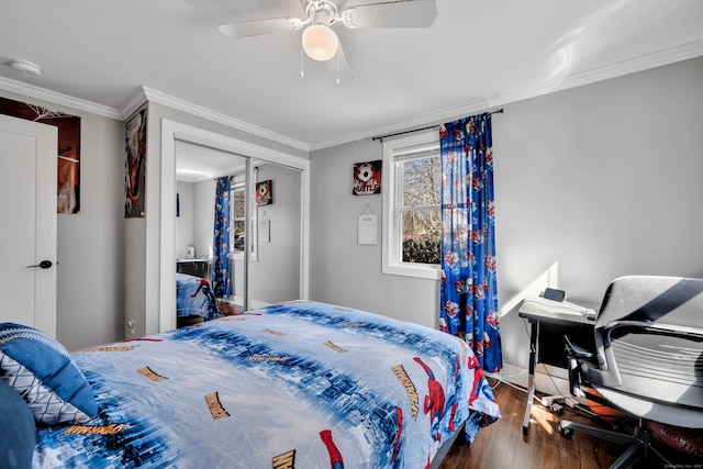 bedroom featuring crown molding, hardwood / wood-style flooring, baseboards, and ceiling fan