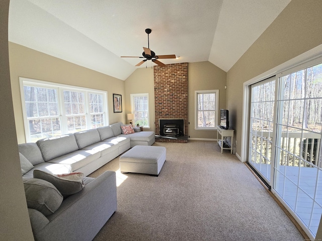 living room featuring baseboards, lofted ceiling, carpet, and ceiling fan