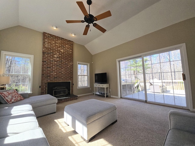 carpeted living room featuring baseboards and vaulted ceiling