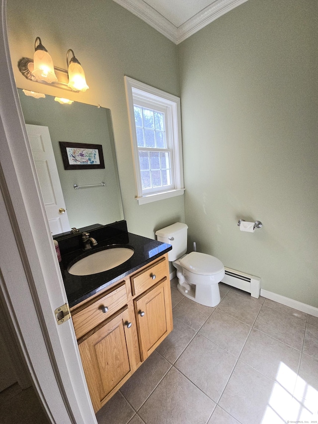 bathroom featuring tile patterned floors, a baseboard heating unit, ornamental molding, and vanity