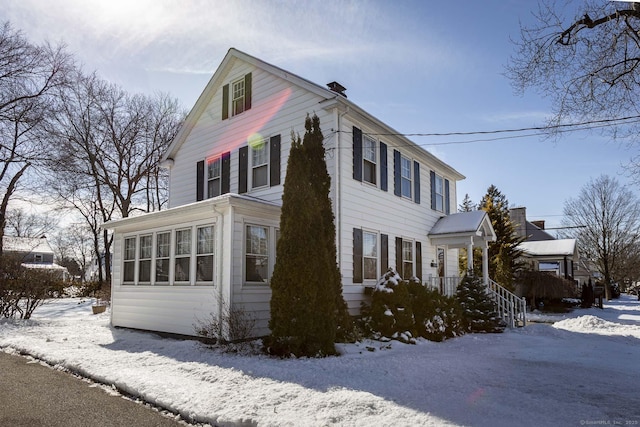 view of snow covered property