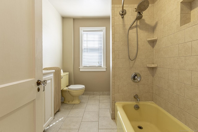 full bathroom with tile patterned flooring, tub / shower combination, and toilet