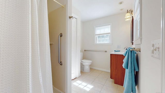 bathroom with tile patterned floors, a shower with curtain, toilet, baseboards, and vanity