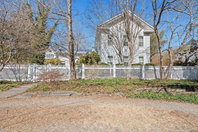 exterior space with a fenced front yard