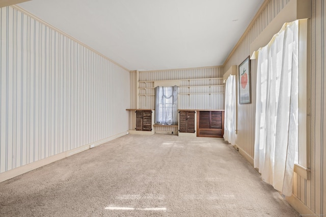 interior space featuring metal wall and carpet floors