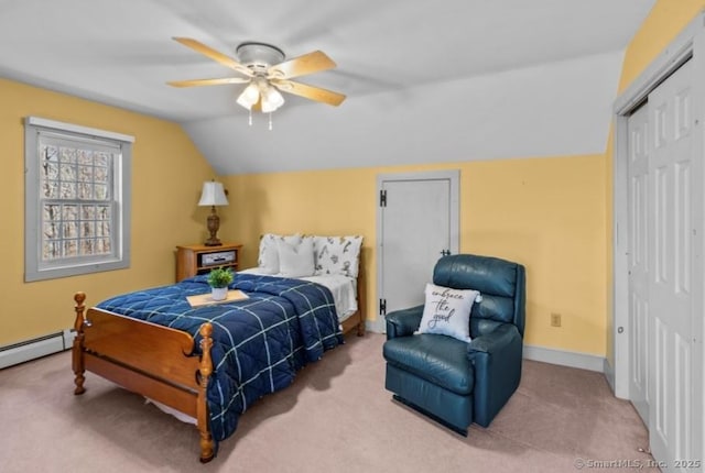 bedroom featuring ceiling fan, baseboards, carpet floors, vaulted ceiling, and a closet