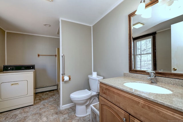 bathroom featuring toilet, crown molding, washer / clothes dryer, and baseboard heating