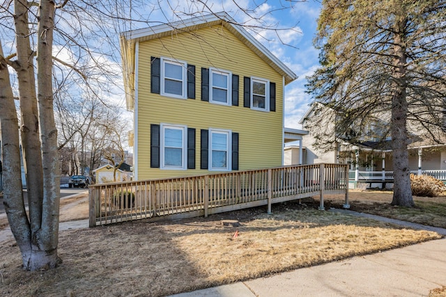 view of front of home with fence