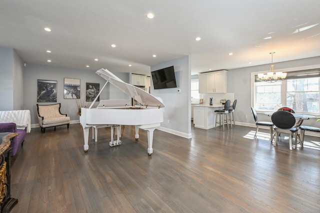 interior space featuring recessed lighting, baseboards, and dark wood-style floors